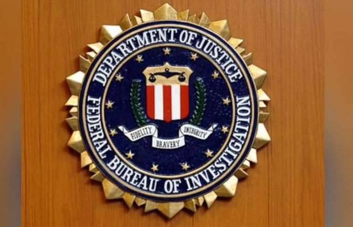 FBI tech pleads guilty to acting as agent of China