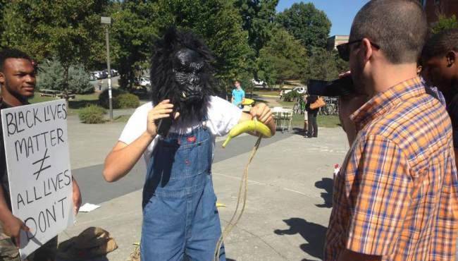Student arrested for wearing gorilla mask to protest