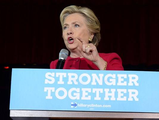 Clinton faces balancing act as she touts unity message in final stretch