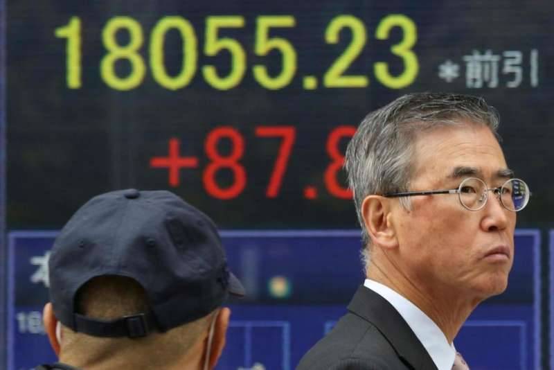 Asia shares listless but China, Japan rise on dollar’s gain