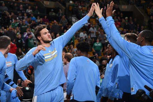 Murray goes off late as Nuggets beat Jazz 105-91