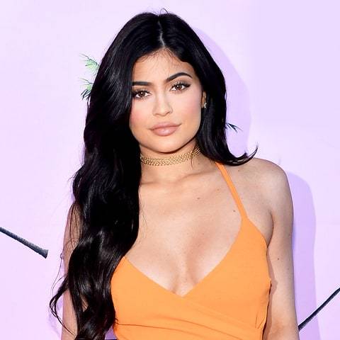 Kylie Jenner Showcases Cleavage, Curves in Bikini in Miami
