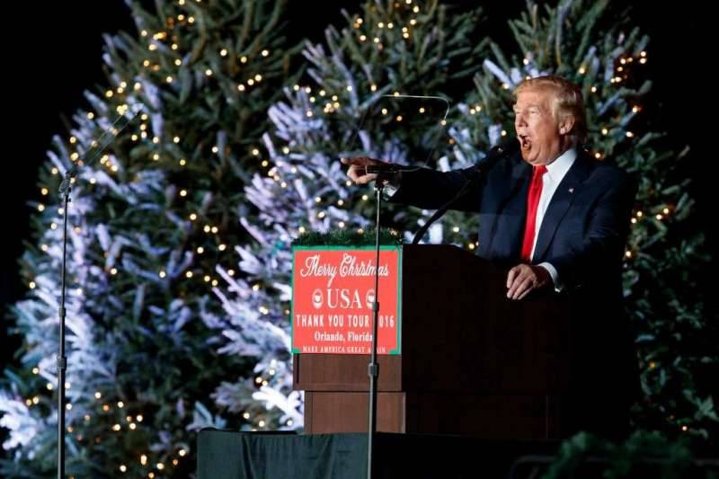 Trump salutes supporters in Florida names budget director