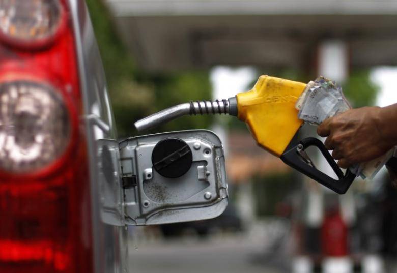 Crude oil rises after report shows drop in stockpiles