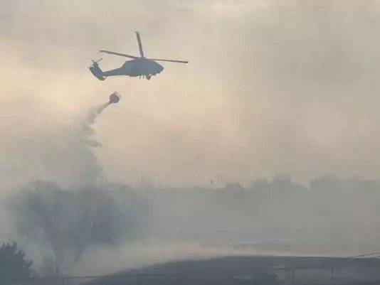 Homes evacuated amid Okla. City grass fire