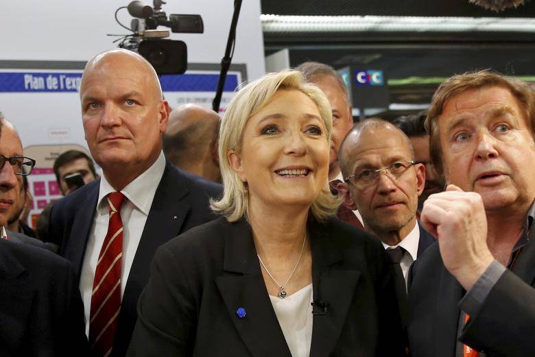 Le Pen retains French poll lead, still seen losing runoff
