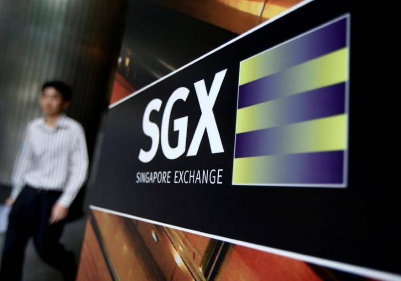 Asia stocks mixed, dollar slips as Fed continues to weigh