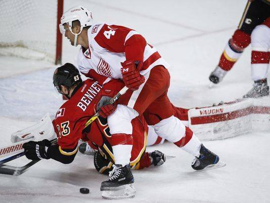 Backlund scores in OT, Flames salvage win over Red Wings