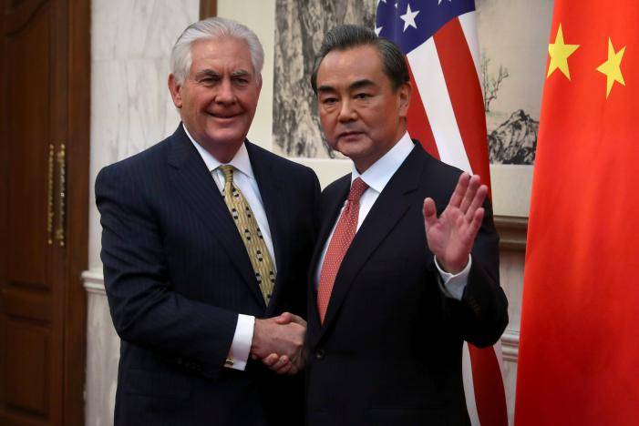 U.S., China soften tone, say to work together on North Korea