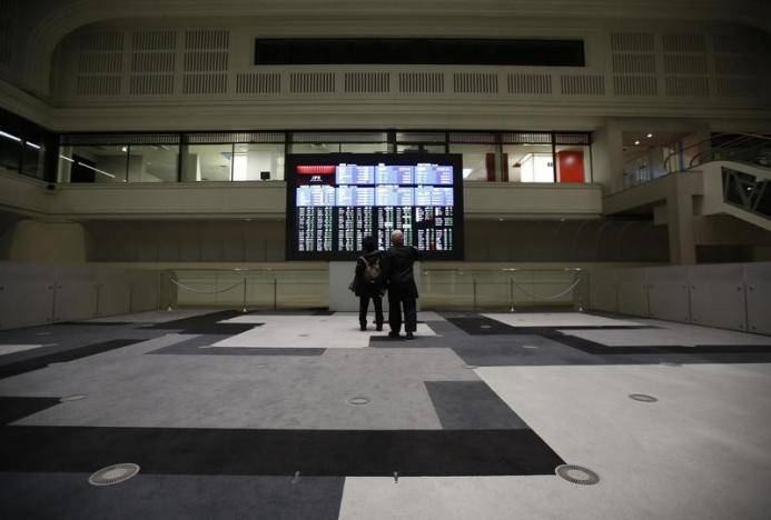 Dollar crunched by cautious Fed, bonds and commodities cheer