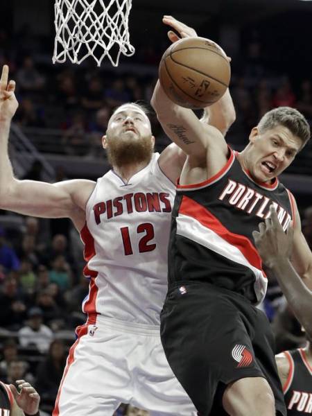 Morris, Pistons outlast Portland 120-113 in OT