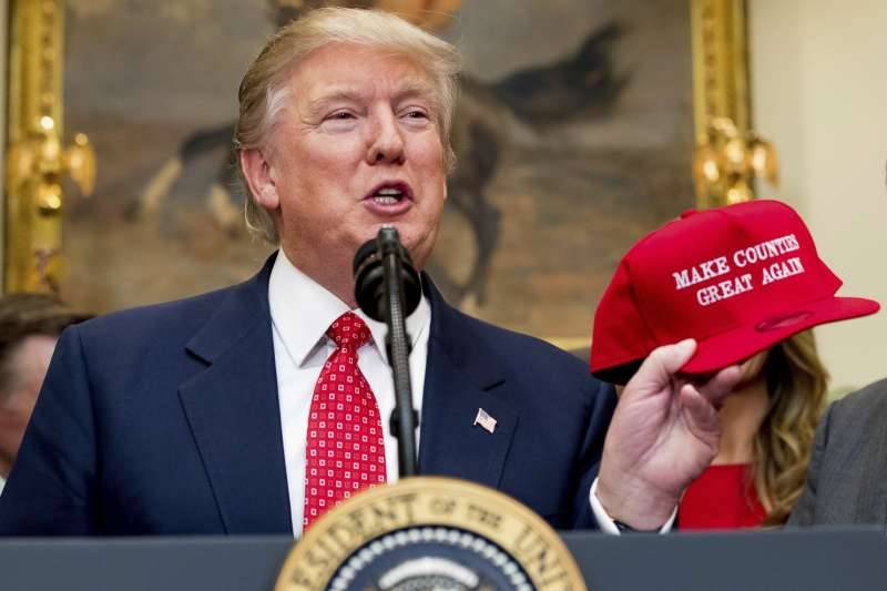 New travel ban will exempt current visa holders, sources say