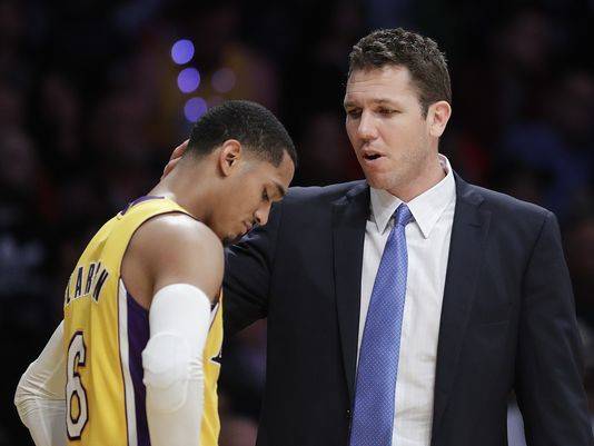 Paul leads Clippers in blowout, watches end with young son