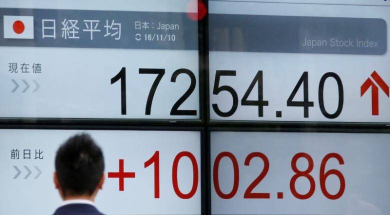 Asian stocks hover near two-year highs on U.S. optimism, euro steady