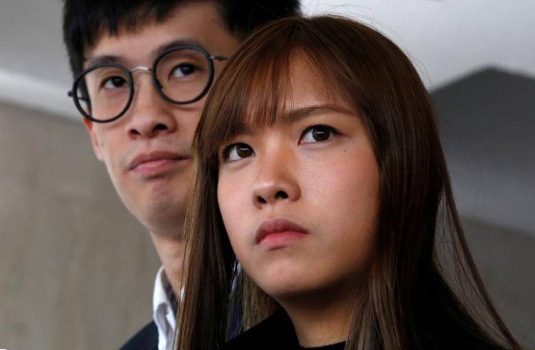 Hong Kong police arrest two disqualified lawmakers: party