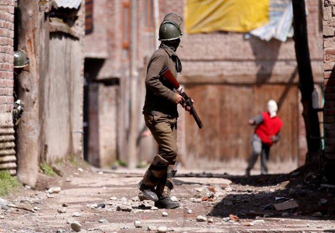 India clamps down on Kashmir transport after poll violence kills eight