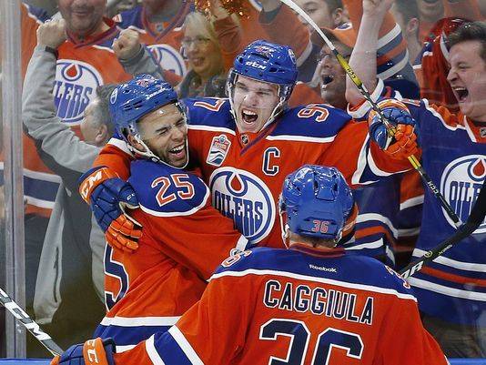 Oilers shut out Sharks for first playoff win since 2006