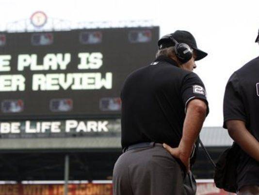 When fans see red, MLB men in blue may soon explain replays