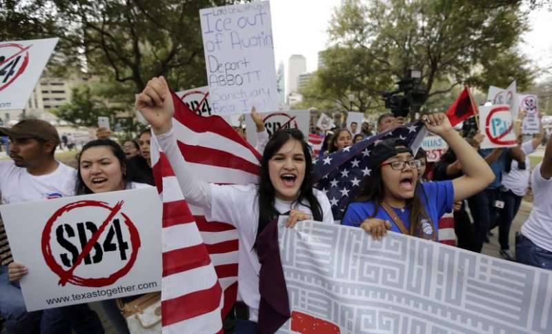 A Texas Republican called ICE on protesters. Then lawmakers started to scuffle