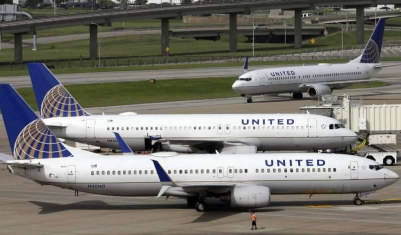 Disruptive passenger in Trump cap delays Shanghai flight