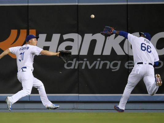 Joc Pederson leaves game after frightening collision with Yasiel Puig