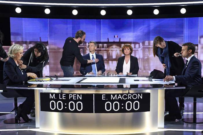 Macron, Le Pen clash on euro, terrorism, in French pre-election TV showdown