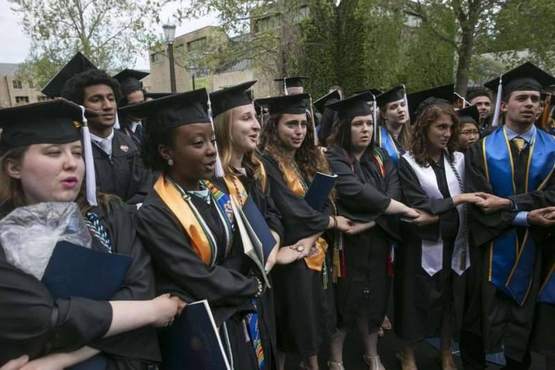 Protesting Notre Dame students walk out of Pence’s commencement speech