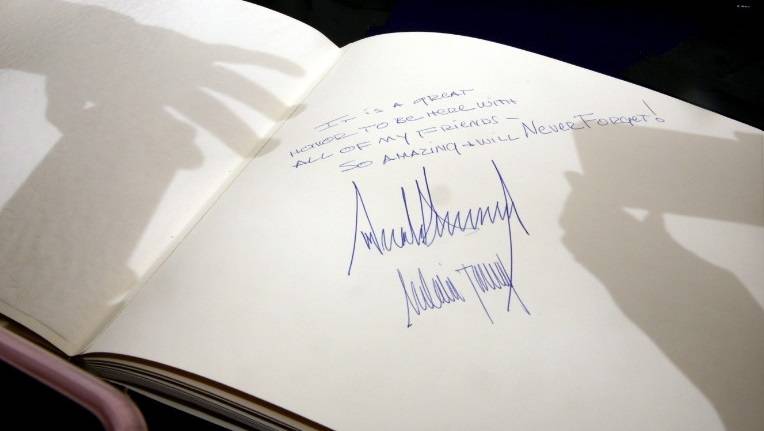 The way President Trump signs guest books is different