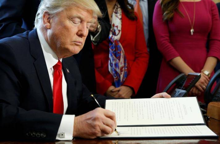 Trump review of Wall Street rules to be done in stages