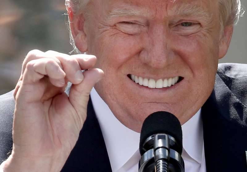 61 US cities and three states vow to uphold Paris climate agreement