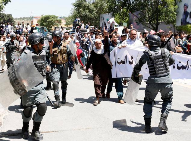 Afghan authorities lock down Kabul after protest clashes