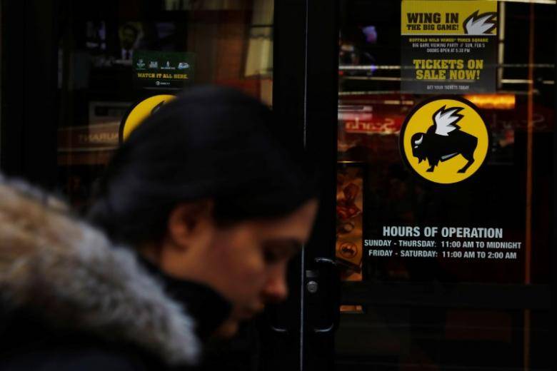 Buffalo Wild Wings CEO to retire as activist Marcato wins board seats