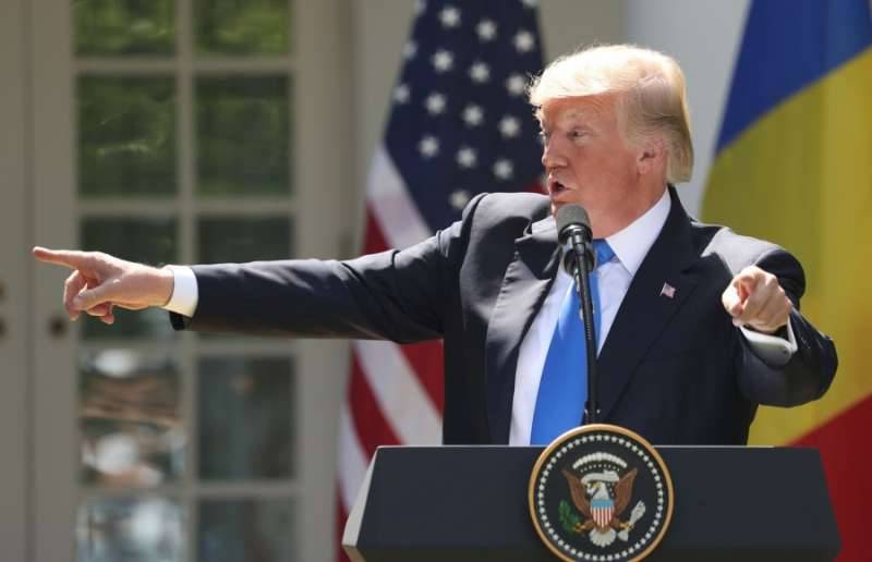 Federal appeals court upholds freeze on Trump travel ban