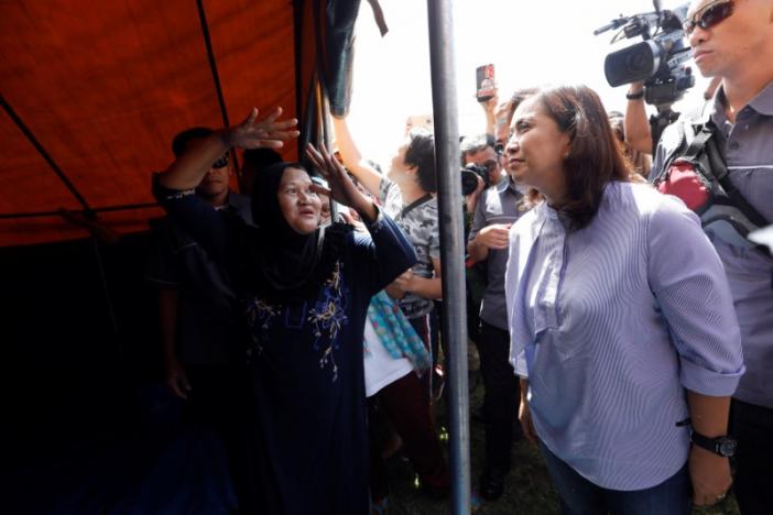 Philippines VP visits refugees fleeing fighting, Duterte unseen in days