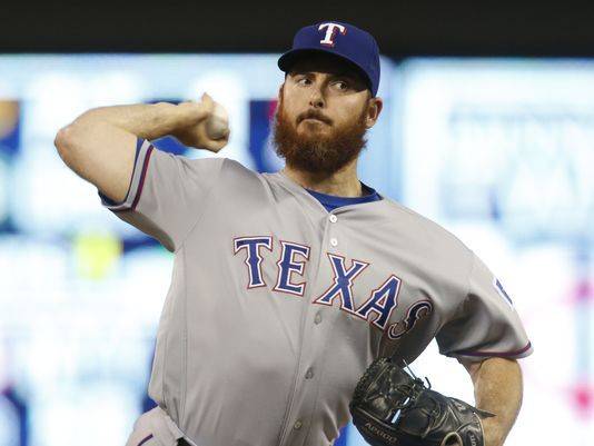 Rangers trade struggling reliever Sam Dyson to Giants