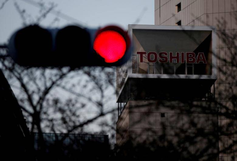 Toshiba shares rise on report Broadcom chosen as chip unit buyer