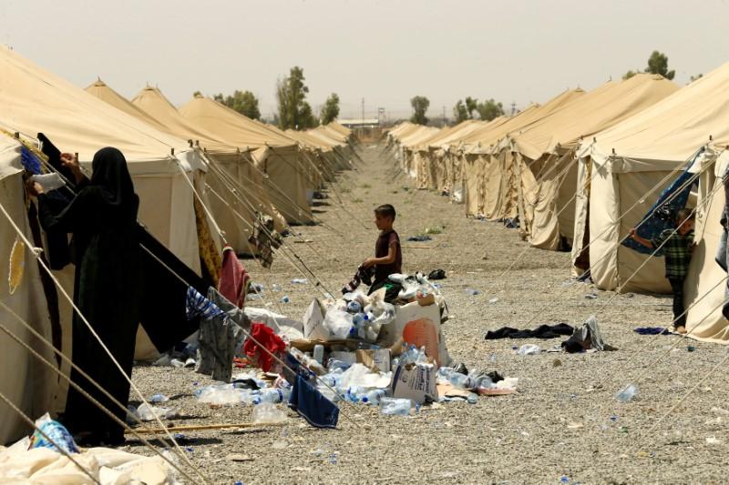 As Islamic State militants routed in Iraq, their families fear reprisals