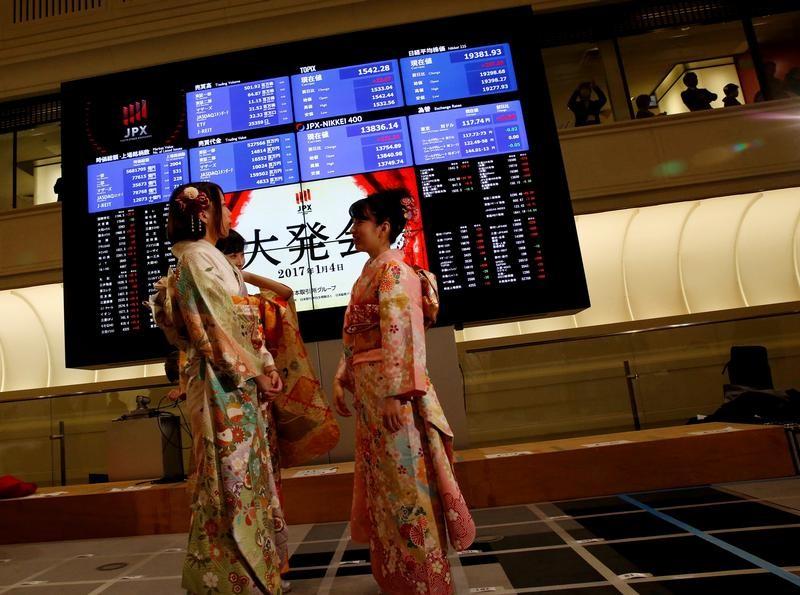 Asian shares slip as risk appetite ebbs, dollar sulks