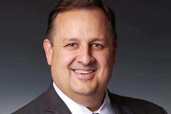 Ethics director who clashed with Trump resigns