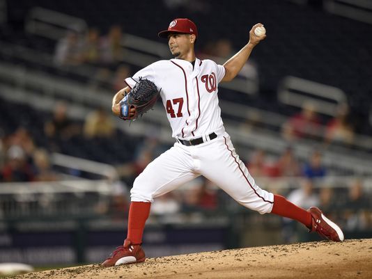Freeman, Braves douse Nationals 5-2 following 3-hour delay