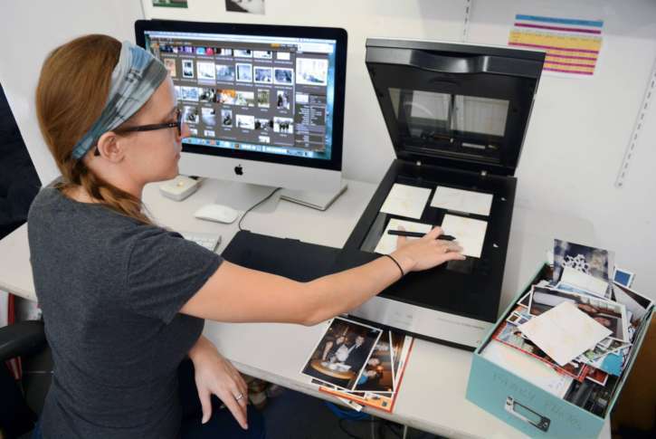 Is your home drowning in old photos? Organizers offer tips