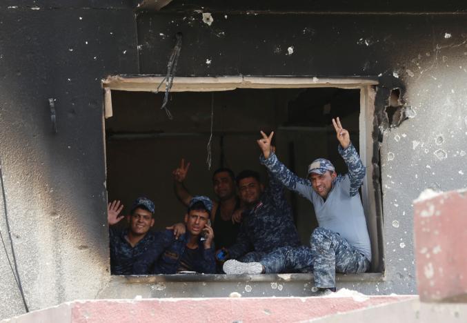 Islamic State cornered in Mosul as Iraq prepares victory celebrations
