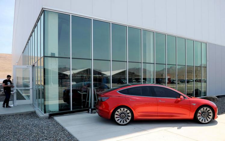 Tesla deliveries at low end of forecast, starting Model 3 production