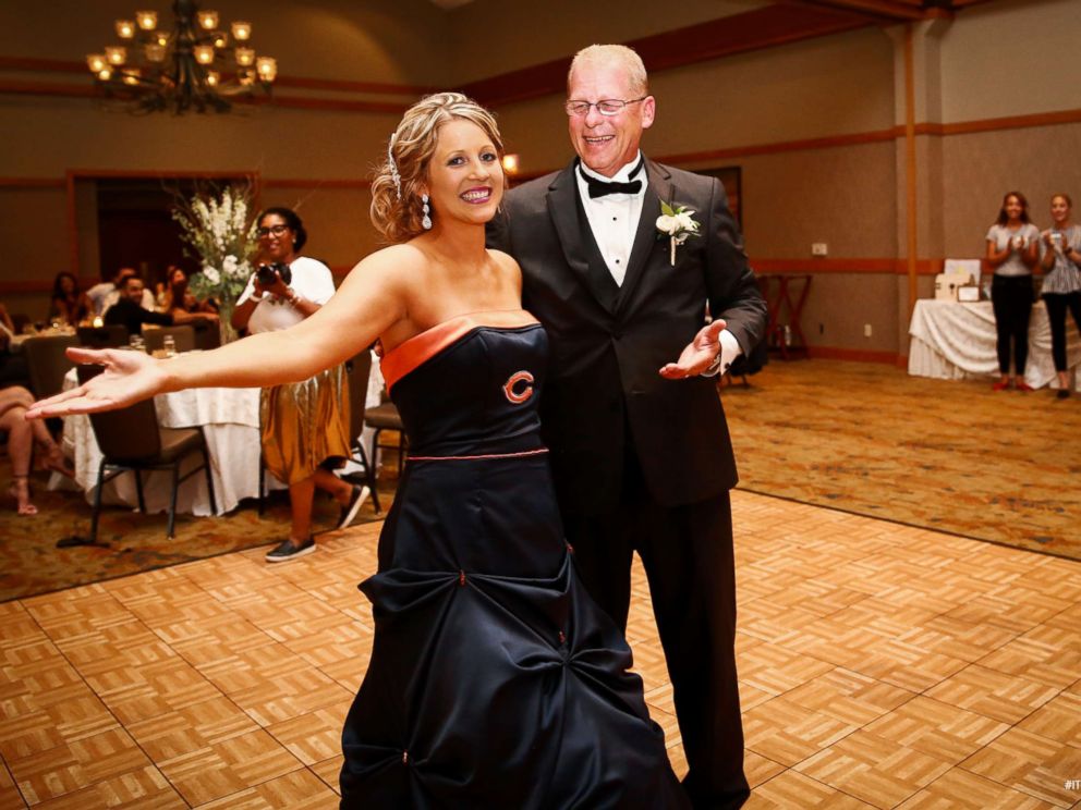 Bride surprises father by wearing Chicago Bears-themed wedding dress for their dance
