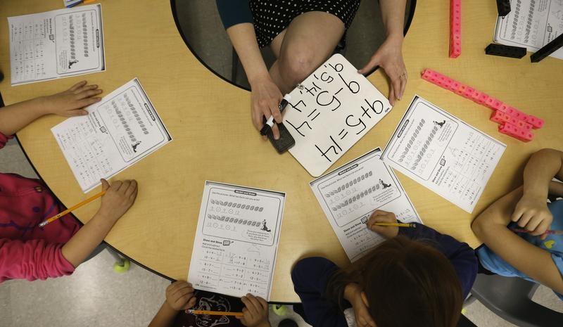 Chicago schools budget counts on uncertain funding