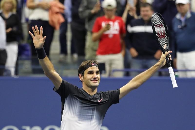Federer survives Tiafoe scare to advance