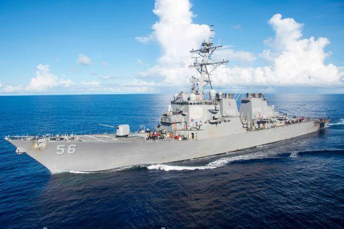 Five sailors injured, 10 missing after U.S. Navy destroyer collides with a merchant ship