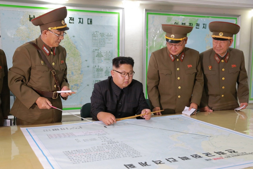 North Korea’s leader holds fire on Guam missile launch