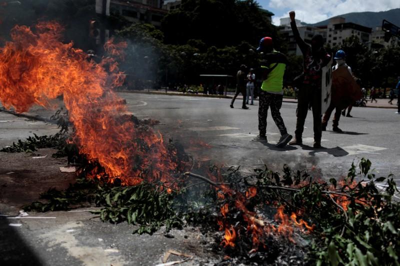 U.S. slaps new sanctions on Venezuela, fugitive mayor defiant