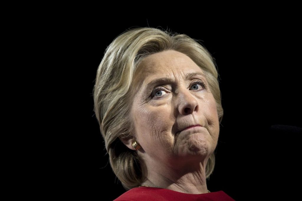 Clinton criticizes Trump for using race to win election